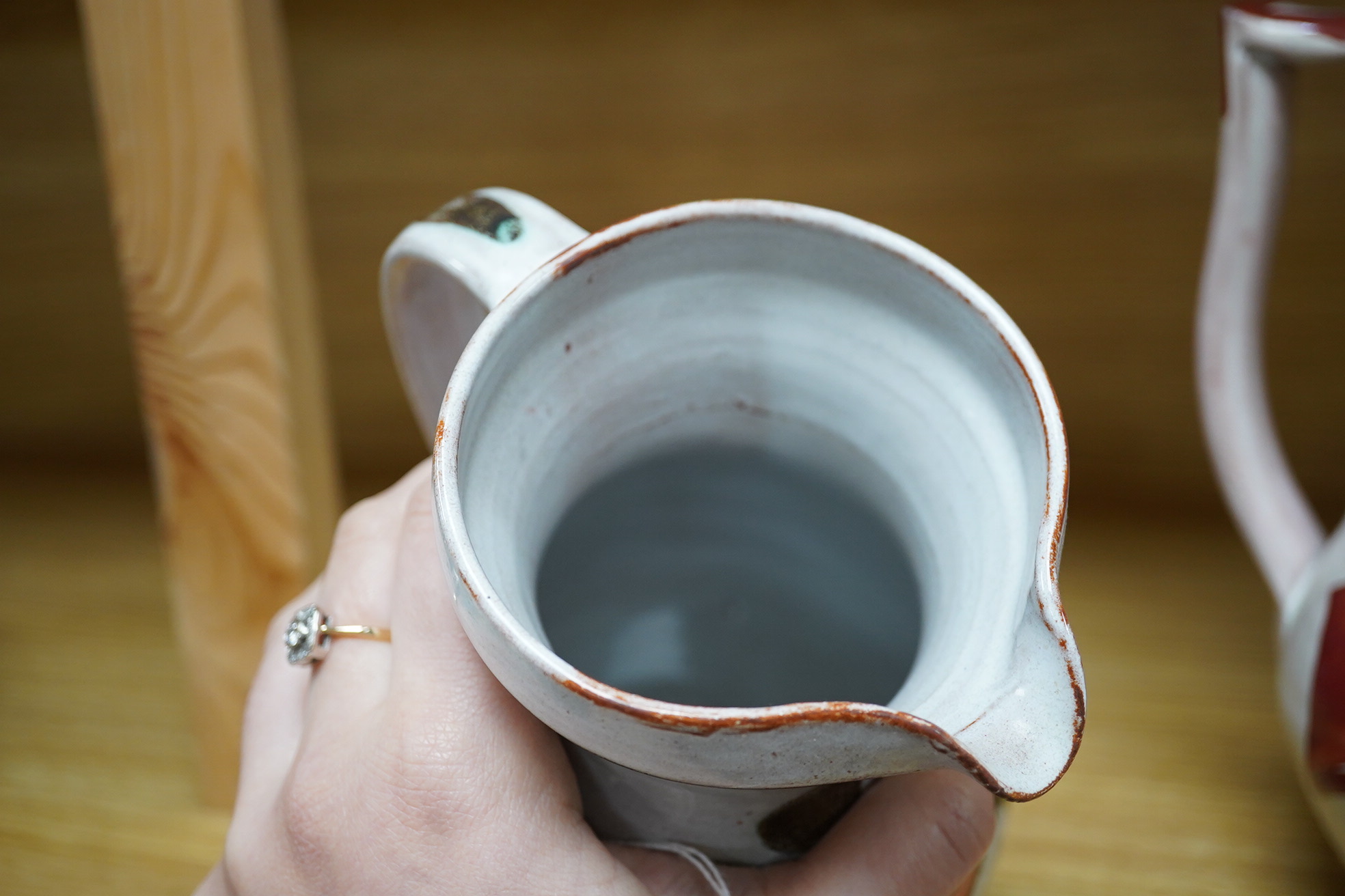 Alan Caiger-Smith (1930-2020), an Aldermaston Pottery lustre glazed jug and another, tallest 22cm. Condition - good